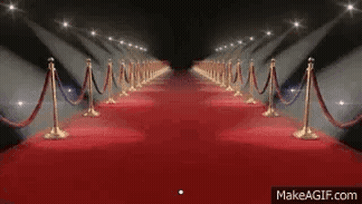 Man In Plague Doctor Costume Walking Down Red Carpet GIF