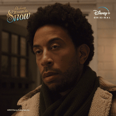 Man In Plaid Jacket And Scarf Disney Advertisement GIF