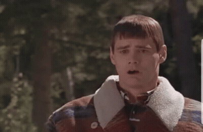 Man in Plaid Jacket and Tie Making Funny Face