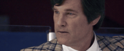 Man In Plaid Jacket And White Shirt Looking At Camera GIF