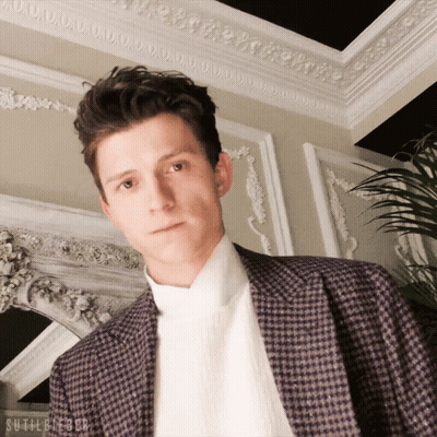 Man In Plaid Jacket And White Turtleneck Sutil GIF