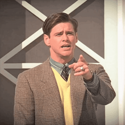 Man In Plaid Jacket And Yellow Sweater Pointing GIF
