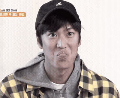 Man In Plaid Shirt And Baseball Cap With S GIF