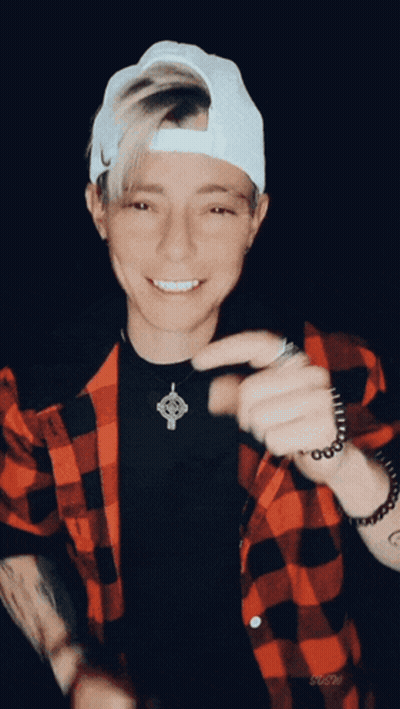 Man In Plaid Shirt And Hat Smiling GIF
