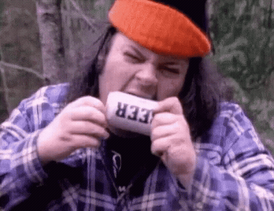 Man In Plaid Shirt And Orange Hat Drinking Beer Mug GIF