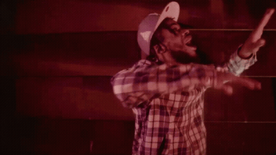Man In Plaid Shirt And Purple Hat Dancing GIF