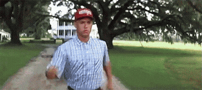 Man In Plaid Shirt And Red Hat Running GIF