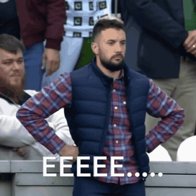 Man In Plaid Shirt And Vest Saying Eeee GIF