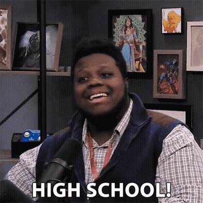 Man In Plaid Shirt And Vest Smiling High School GIF