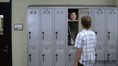 Man In Plaid Shirt At Hockey Webcast Locker GIF