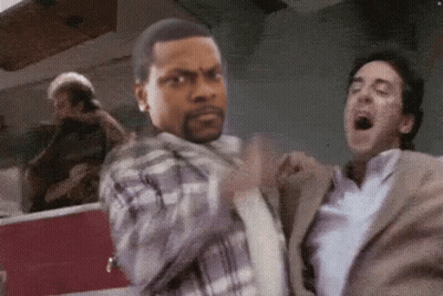Man In Plaid Shirt Fighting Man In Suit GIF