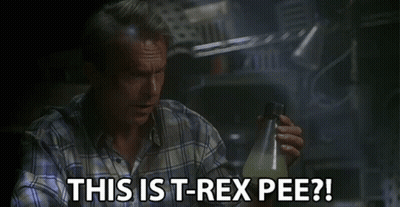 Man In Plaid Shirt Holding Bottle Says This Is T-Rex Pee GIF