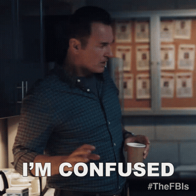 Man In Plaid Shirt Holding Coffee Says I'm Confused GIF