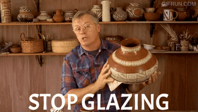 Man In Plaid Shirt Holding Vase Saying Stop Glazing GIF