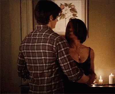 Man In Plaid Shirt Hugging Woman In Black Tank Top GIF