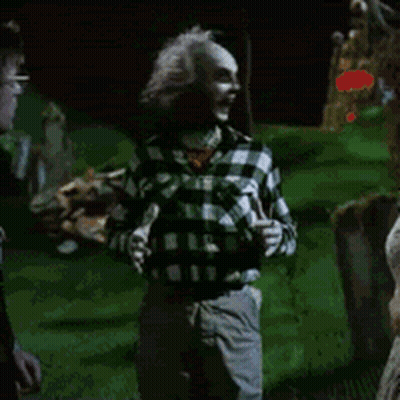 Man In Plaid Shirt In Cemetery GIF