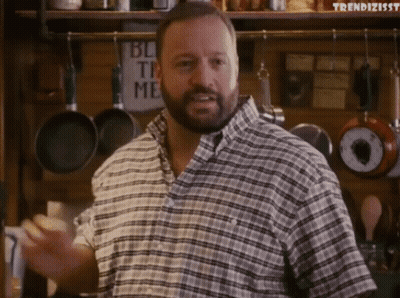 Man In Plaid Shirt In Front Of Block The Me Sign GIF