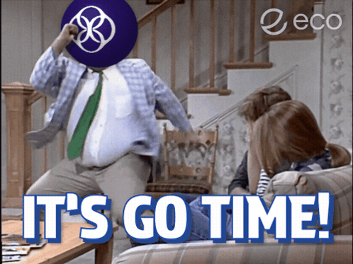 Man in Plaid Shirt Jumping With Go Time