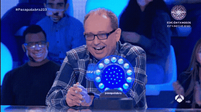 Man In Plaid Shirt Laughing Holding Blue Javi Object GIF