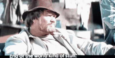 Man In Plaid Shirt Looking Through Sunglasses GIF