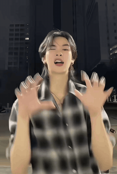 Man In Plaid Shirt Making Face With Hands Outstretched GIF