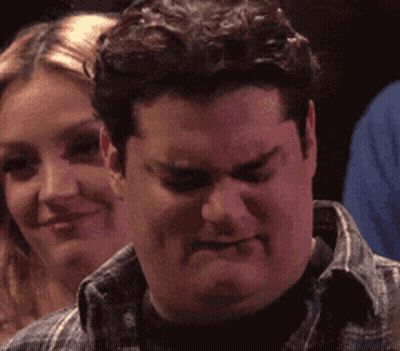 Man In Plaid Shirt Making Funny Face GIF