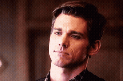 Man In Plaid Shirt Making Funny Face GIF