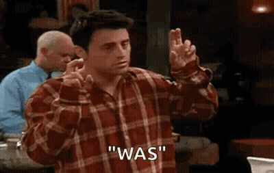 Man In Plaid Shirt Making Peace Sign GIF