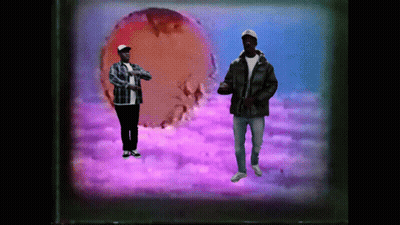 Man In Plaid Shirt Next To Man In Black Jacket GIF
