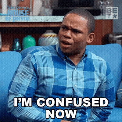 Man In Plaid Shirt On Blue Couch Says I'm Confused Now GIF