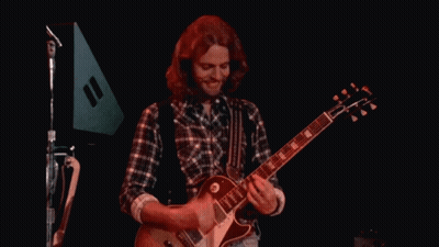 Man In Plaid Shirt Playing Guitar GIF