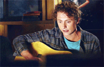 Man In Plaid Shirt Playing Guitar GIF