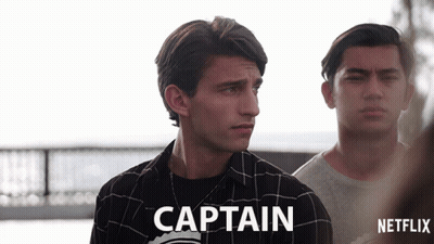 Man In Plaid Shirt Saying Captain GIF