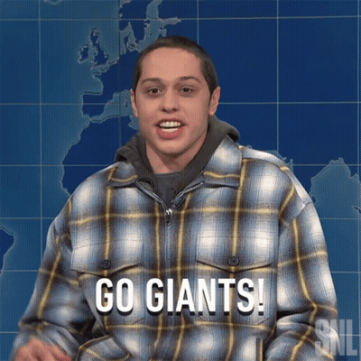 Man In Plaid Shirt Saying Go Giants GIF