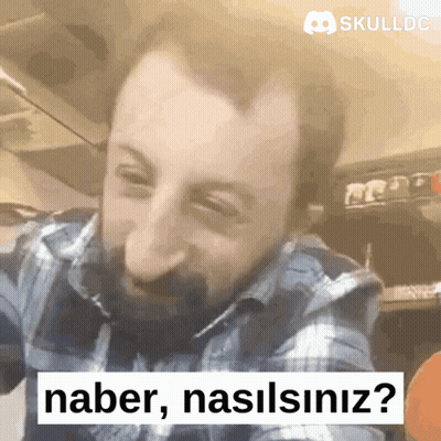 Man In Plaid Shirt Saying Haber Nasilsiniz In Front Of Skulldc Logo GIF