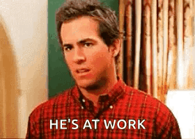 Man In Plaid Shirt Saying Hes At Work GIF