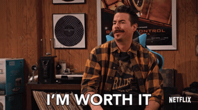 Man In Plaid Shirt Saying I'm Worth It In Front Of Netflix Sign GIF