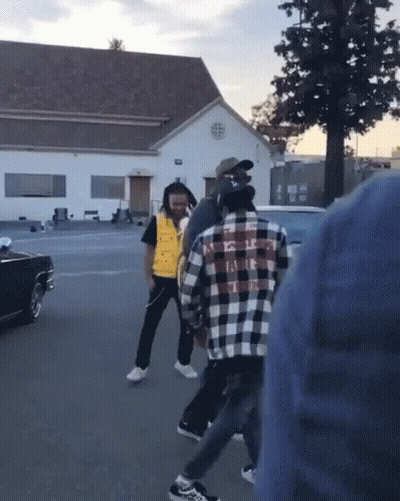Man In Plaid Shirt Saying NC On Back GIF