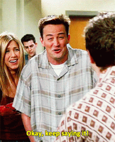 Man In Plaid Shirt Says Okay Keep Saying It To Another Man GIF