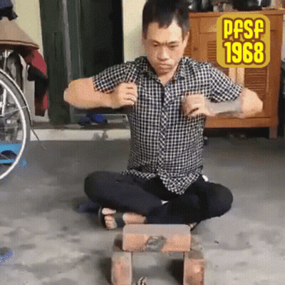 Man In Plaid Shirt Sitting Before Wheelchair Sign PFSF 1968 GIF