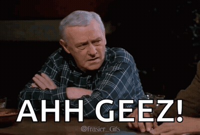 Man In Plaid Shirt Sitting With Arms Crossed Saying Ahh Geez GIF
