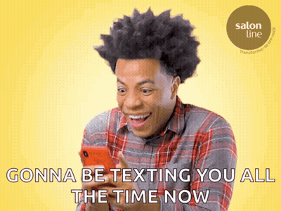 Man In Plaid Shirt Smiling At Phone Gonna Be Texting You All The Time Now GIF