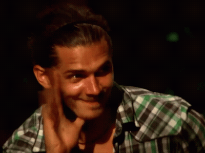 Man In Plaid Shirt Smiling Hand On Chin GIF