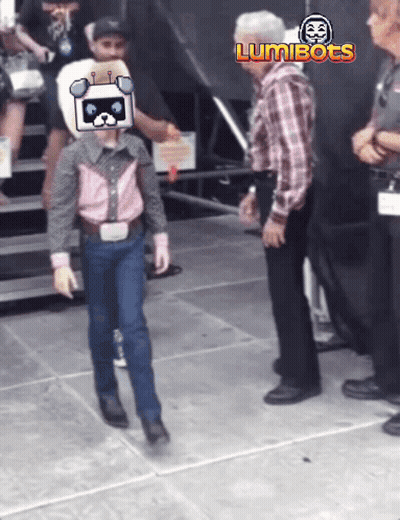 Man In Plaid Shirt Standing Before Luminbots Sign GIF
