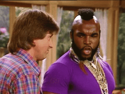 Man In Plaid Shirt Standing Next To Man In Purple Shirt GIF