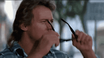 Man In Plaid Shirt Taking Off Sunglasses GIF