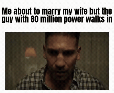 Man In Plaid Shirt Talking About Marrying Wife While Guy With 80 Million Power Walks In GIF