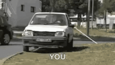 Man In Plaid Shirt Talking To Another Man In Car GIF