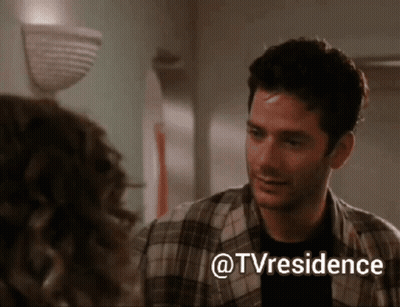 Man In Plaid Shirt Talks To Woman In Hallway @Tvresidence GIF