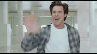 Man In Plaid Shirt Waving GIF